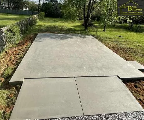 clean sidewalk extension in a green grassy yard, as seen in concrete sidewalks